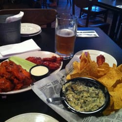 Warehouse Food Drinks Games - Saranac Root Beer on tap and the best wings I've had in a LONG time. Big beers and the arcade won my husband over!