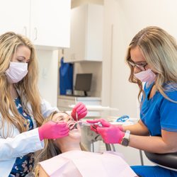 Magnolia Ridge Dentistry - Dr. Schuster and RDA treating a patient at Magnolia Ridge Dentistry
