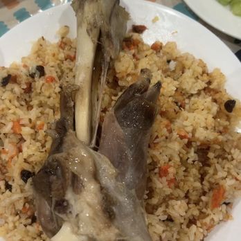 Turan Uyghur Kitchen - E3. Lamb Shank Polow E3. - Halal Near Me - Houston, Texas
