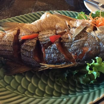 Thai Peppers - Crispy fried rock fish with garlic basil sauce - Thai Near Me - Bristow, Virginia Thai Peppers - Crispy fried rock fish with garlic basil sauce - Thai Near Me - Bristow, Virginia