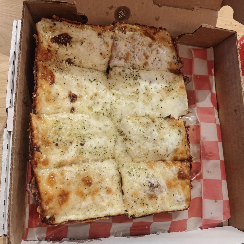 Pizza Wizard - Garlic bread aka Football Bread - Pizza Near Me - Rochester, New York Pizza Wizard - Garlic bread aka Football Bread - Pizza Near Me - Rochester, New York