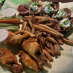 Callahans Irish Pub & Grill - Sampler Platter ($17): chicken wings, fries instead of onion rings, and potato skins. Side of bleu cheese dressing ($0.50).