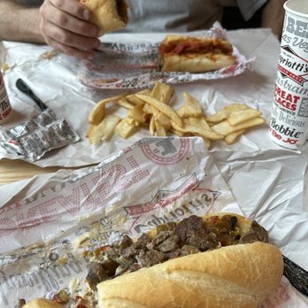 Capriotti's Sandwich Shop - Classic cheesesteak & Italian Sausage with flat fries. - Fast Food Near Me - Flower Mound, Texas