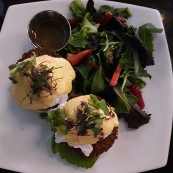 Limericks Tavern - Egg benedict with crab cake and a side of strawberry salad - New American Near Me - Alhambra, California