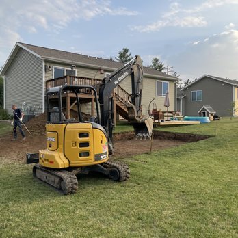 MW Earthworx - a backhoe of a small excavator - Landscaping Near Me MW Earthworx - a backhoe of a small excavator - Landscaping Near Me