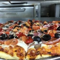 Brugos Pizza and Italian Bistro - First time here? Our Award Winning 14" Mama Mia Spicy Hot Italian pizza and one shared side is a safe, satisfying order for two!