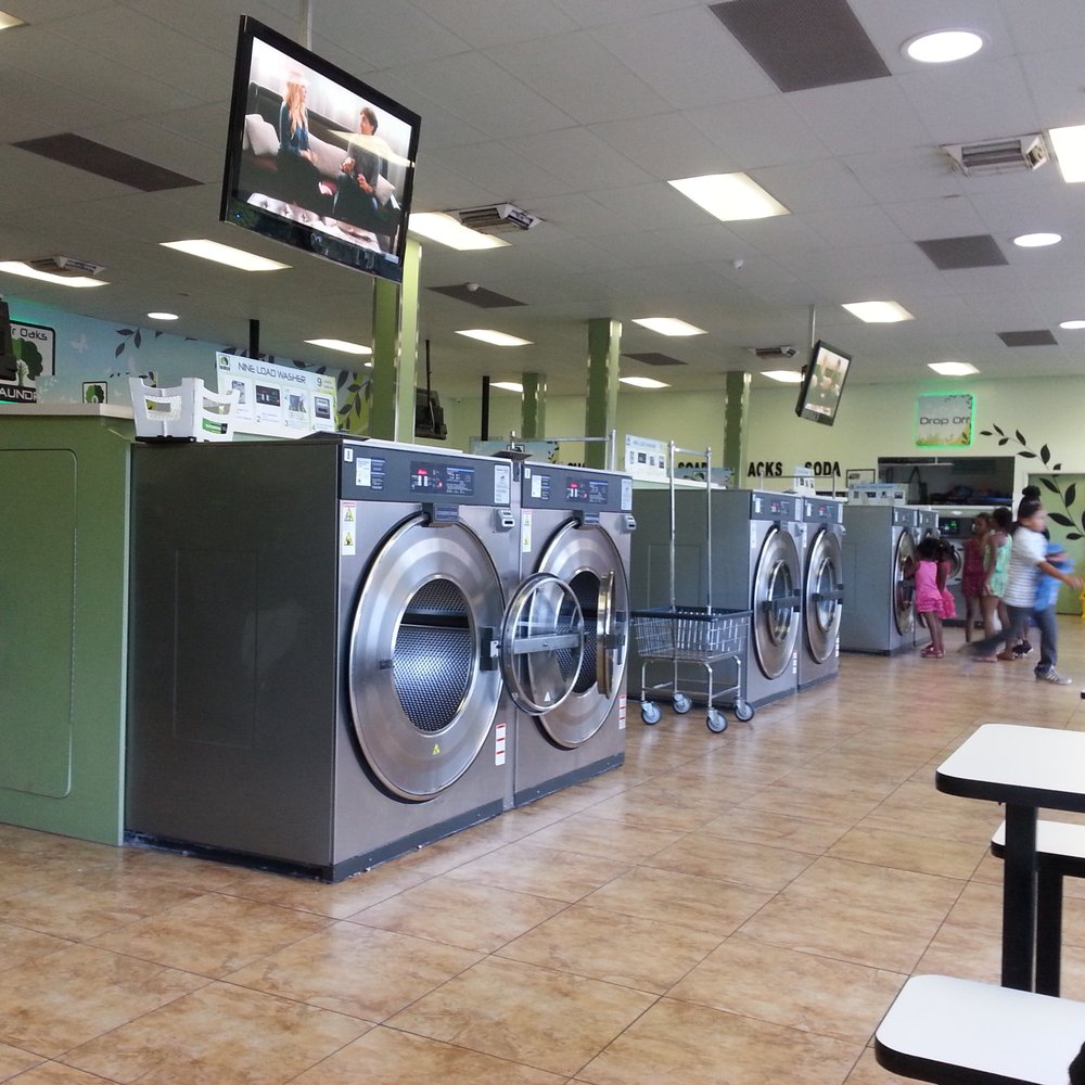 Fair Oaks Laundry - Inside of the laundromat. Includes tv's, cars that can go outside and lots of seating! - Laundromat Near Me - Pasadena, California Fair Oaks Laundry - Inside of the laundromat. Includes tv's, cars that can go outside and lots of seating! - Laundromat Near Me - Pasadena, California