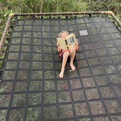 Savannah's Meadow - Reading amongst the trees!