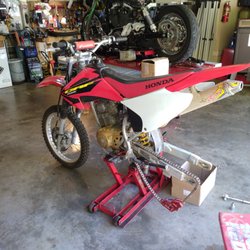 Old Dude's Garage - Customer brought this bike in with a busted wheel hub, we replaced the wheel hub, laced wheel with new spokes intrude the wheel.