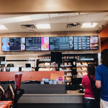 Dunkin Donuts - a woman and a child at the counter - Donuts Near Me - Maple Grove, Minnesota Dunkin Donuts - a woman and a child at the counter - Donuts Near Me - Maple Grove, Minnesota