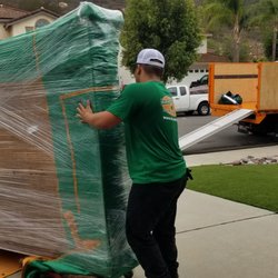 College Hunks Hauling Junk & Moving - Poway - Down the driveway wit support, see how nicely it is wrapped