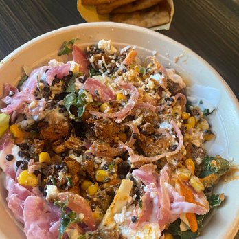 CAVA - Green and grains bowl with pita chips. - Salad Near Me - Jacksonville, Florida