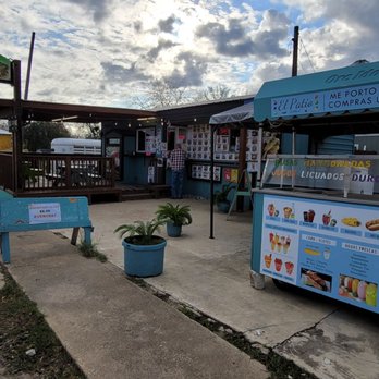 Lugos Tacos - a food stand and a sidewalk - Mexican Near Me - Luling, Texas