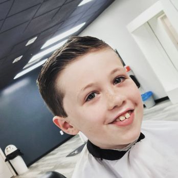 Estillos Barber Studio - Charlie loves his haircut! Aways leaves with a smile! - Barbers Near Me - Oak Park, Illinois