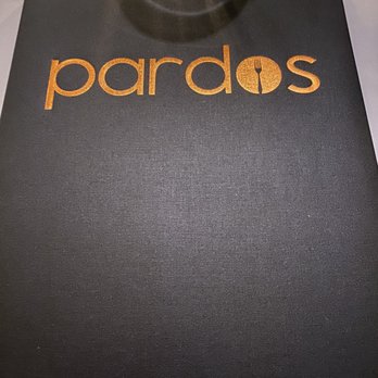Pardos Bistro - a glass of wine on a table - New American Near Me - Mandeville, Louisiana