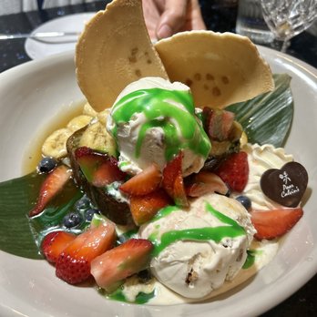 Poor Calvin's - Toasted Poundcake w ice cream & strawberries - Asian Fusion Near Me - Atlanta, Georgia