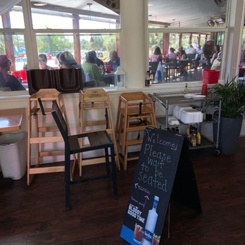 Upper Deck - Upper seating area with view of Weeki Watchee River. - Sports Bars Near Me - Weeki Wachee, Florida