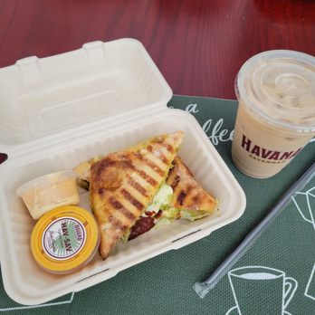 Havana Savannah - Tomato & mozzarella pesto panini with an iced latte. - Cafes Near Me - Valencia, California Havana Savannah - Tomato & mozzarella pesto panini with an iced latte. - Cafes Near Me - Valencia, California