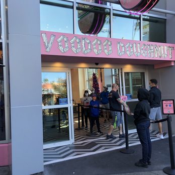 Voodoo Doughnut - Entrance is monitored by an employee who limits the number of customers in the store. - Bakeries Near Me - Orlando, Florida Voodoo Doughnut - Entrance is monitored by an employee who limits the number of customers in the store. - Bakeries Near Me - Orlando, Florida