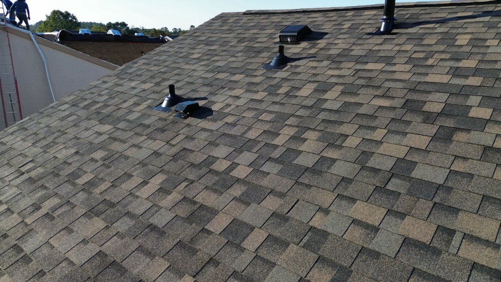 Slide of Whipple Roofing