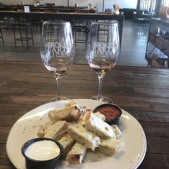 Broken Earth Winery - Rose wine and garlic cheese bread - New American Near Me - Paso Robles, California Broken Earth Winery - Rose wine and garlic cheese bread - New American Near Me - Paso Robles, California