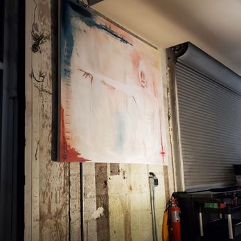 Liquid Diet - a painting on a wall in a garage - Cocktail Bars Near Me - Las Vegas, Nevada Liquid Diet - a painting on a wall in a garage - Cocktail Bars Near Me - Las Vegas, Nevada