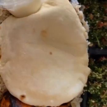 Fufu's Mid East Grill - 2 skews of chicken kabob, 2 sides of tabouli, 1 pita bread, rice, 1 side of garlic sauce. - Mediterranean Near Me - Riverside, California
