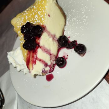Amano - Lemon marscapone cheesecake with blueberry compote - Pizza Near Me - Las Vegas, Nevada Amano - Lemon marscapone cheesecake with blueberry compote - Pizza Near Me - Las Vegas, Nevada