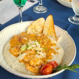 Shrimp and grits, Mermaid Mimosa (green) Shaffner Mimosa (orange). Shrimp and grits, Mermaid Mimosa (green) Shaffner Mimosa (orange).