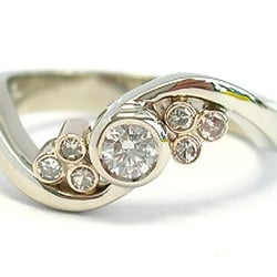 Conger's Jewellers - Custom made Diamond Engagement Ring - By-pass style with bezel settings.