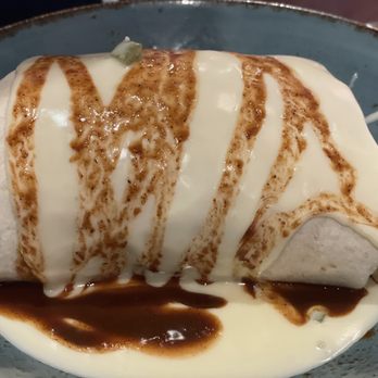 RuRu's Tacos + Tequila - Pork belly carnitas burrito - Tex-Mex Near Me - Charleston, South Carolina RuRu's Tacos + Tequila - Pork belly carnitas burrito - Tex-Mex Near Me - Charleston, South Carolina