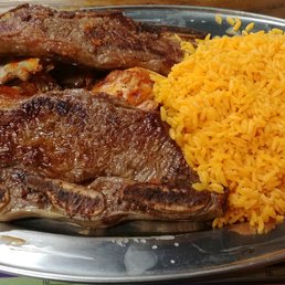 Combo#5: Half roast chicken & two beef ribs with yellow rice (one of two sides; other note shown). Combo#5: Half roast chicken & two beef ribs with yellow rice (one of two sides; other note shown).