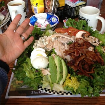 Black Bear Diner Sequim - ENORMOUS Cobb Salad next to my hand for scale. could have shared this with 4 people, IMO.  basic salad. good value. - American Near Me - Sequim, Washington