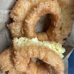 Henry Donuts - Yellow and poor tasting old fashioned donuts are due to old fryer oil. Yuck man, clean your fryer!