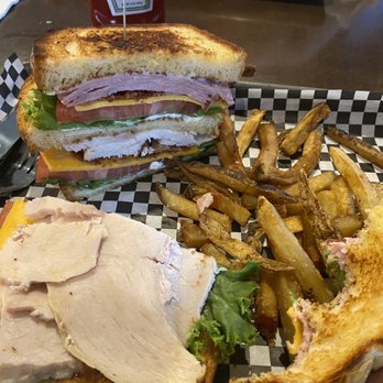The Asylum - Club sandwich with fries. So large I had to disassemble just to fit it in my mouth. - Cocktail Bars Near Me - Lewisburg, West Virginia The Asylum - Club sandwich with fries. So large I had to disassemble just to fit it in my mouth. - Cocktail Bars Near Me - Lewisburg, West Virginia