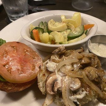 Red Rocks Cafe - Bob Cavalline's Crab Cake Sandwich with added mushrooms and sautéed onions - Bars Near Me - Charlotte, North Carolina Red Rocks Cafe - Bob Cavalline's Crab Cake Sandwich with added mushrooms and sautéed onions - Bars Near Me - Charlotte, North Carolina