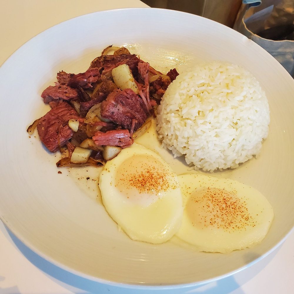 Bogart's Cafe - Corned Beef Hash Brisket ($19.00 cash / $19.67 card). House made corned beef with potatoes, onions, two eggs served with rice. - Breakfast & Brunch Near Me - Honolulu, Hawaii Bogart's Cafe - Corned Beef Hash Brisket ($19.00 cash / $19.67 card). House made corned beef with potatoes, onions, two eggs served with rice. - Breakfast & Brunch Near Me - Honolulu, Hawaii
