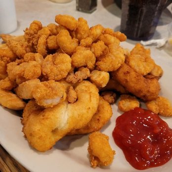 Sanibel's - Kids popcorn shrimp. Even the kids plates are pretty big. My done eats as much as he wants and still takes some home for later:) - Seafood Near Me - High Point, North Carolina
