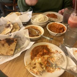 Spice Connexion - Roti, garlic naan, chicken tikka masala, and lamb vindaloo, strawberry Lasi, Mango Lasi. Food was great!