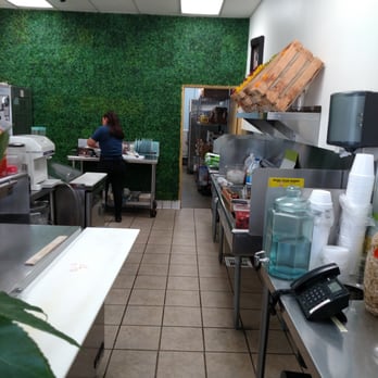 Fruitopia Juice Bar - green turf on wall.  Can I walk on it sideways? - Juice Bars & Smoothies Near Me - West Covina, California