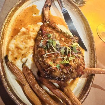 Luce Italian Kitchen - Tomahawk pork chop - Italian Near Me - Little Rock, Arkansas Luce Italian Kitchen - Tomahawk pork chop - Italian Near Me - Little Rock, Arkansas