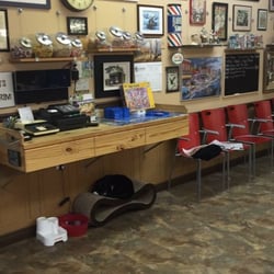 Ken's Barber Shop - Traditional men's barbershop. Been in business since 1960.  Flat tops, crew cuts, military and current cuts.