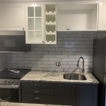 Take Pride Construction - New cabinets built and hung, microwave. Also added in new kitchen lighting, removed popcorn - General Contractors Near Me