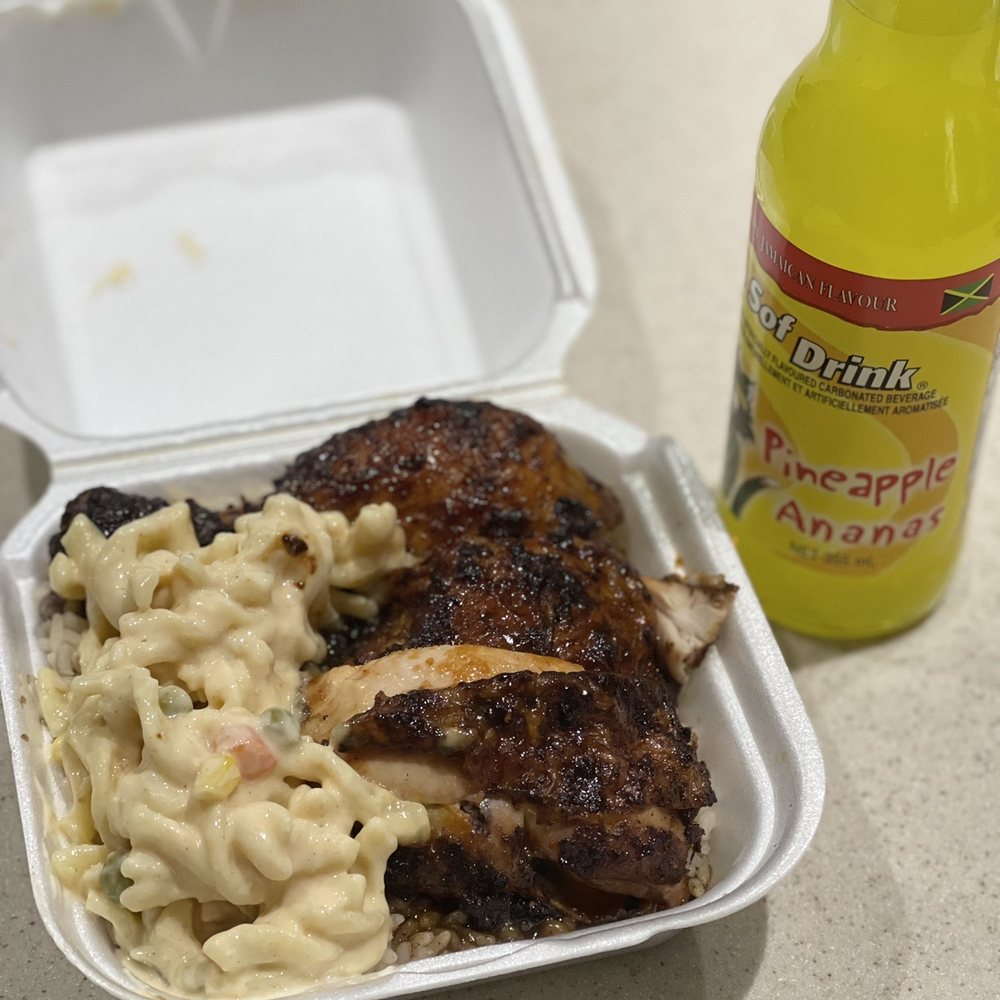 Jerk Chicken with Oxtail Gravy, Rice & Peas, Pasta Salad