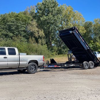 Doin’ It Wells Services -  a truck with a dump trailer attached to it - Fences & Gates Near Me - Frankfort, Indiana