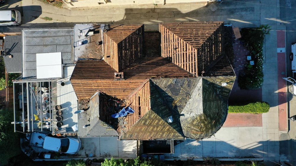 Slide of Rafael’s Tear-off & Hauling