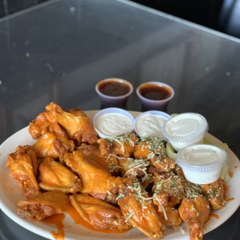 Anchor Bar - Double Traditional Wings (~$25): Medium & Spicy Garlic Parmesan sauces with ranch, bleu cheese, and bourbon BBQ and chipotle BBQ sauces - Chicken Wings Near Me - Buffalo, New York Anchor Bar - Double Traditional Wings (~$25): Medium & Spicy Garlic Parmesan sauces with ranch, bleu cheese, and bourbon BBQ and chipotle BBQ sauces - Chicken Wings Near Me - Buffalo, New York