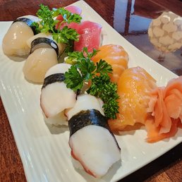 Nigiri: octopus, scallops, salmon,  tuna.