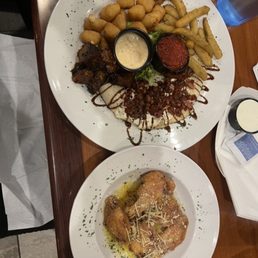 I had the Sampler Platter and 5 garlic Parmesan wings I had the Sampler Platter and 5 garlic Parmesan wings