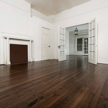 KNX Construction - an empty living room with hardwood floors - General Contractors Near Me KNX Construction - an empty living room with hardwood floors - General Contractors Near Me
